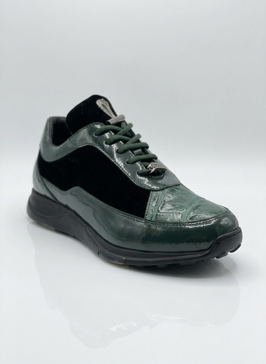 A single Mauri 8900/8 Velvet Embossed Alligator Patent Green shoe, featuring a dark green and black Italian design with a combination of suede and patent leather finish, is displayed on a plain white background.