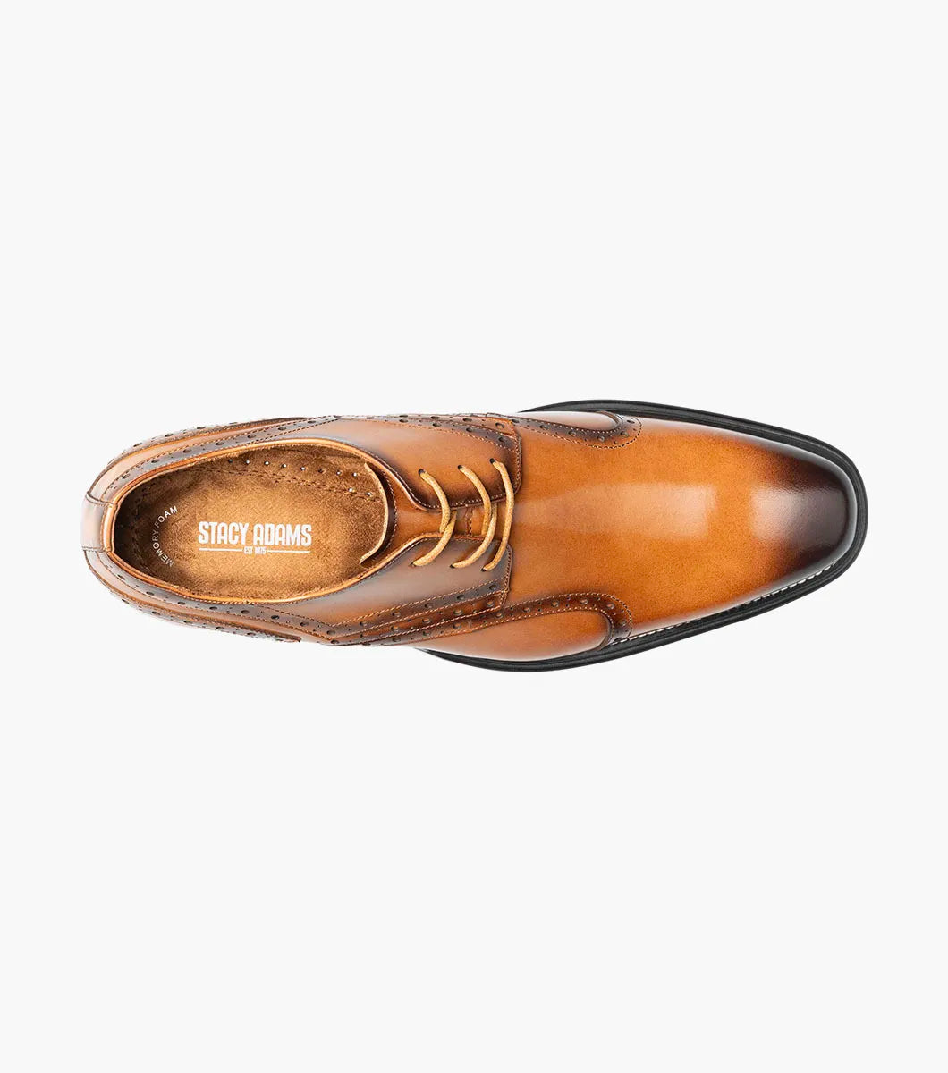 The Stacy Adams Alexander Plain Toe Oxford in tan (25791-240) is a single men’s dress shoe made from brown calf leather, featuring elegant brogue detailing and laces. Photographed against a white background, it offers enhanced comfort with Memory Foam cushioning.