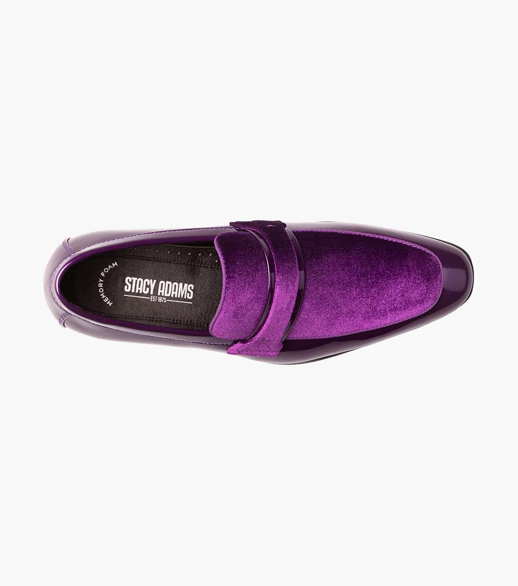 A single STACY ADAMS Spratley Moc Toe Saddle Slip On in purple (style 25686-542) is displayed against a plain white background, showcasing its shiny velour upper, low black heel, and comfortable memory foam insole.