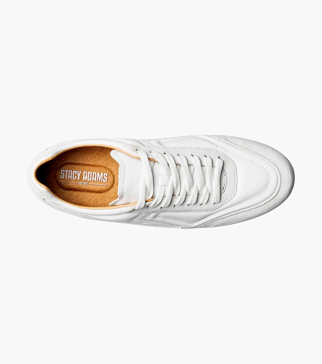 Introducing the Stacy Adams Action 150 Sporty Lace Up in White (style 25797-100), these men’s sneakers from STACY ADAMS feature a low-top silhouette with white laces, suede accents around the toe, a gum sole, and a subtle embossed design on the side. Photographed on a clean white background, these casual sneakers offer timeless style and sporty details for versatile everyday wear.