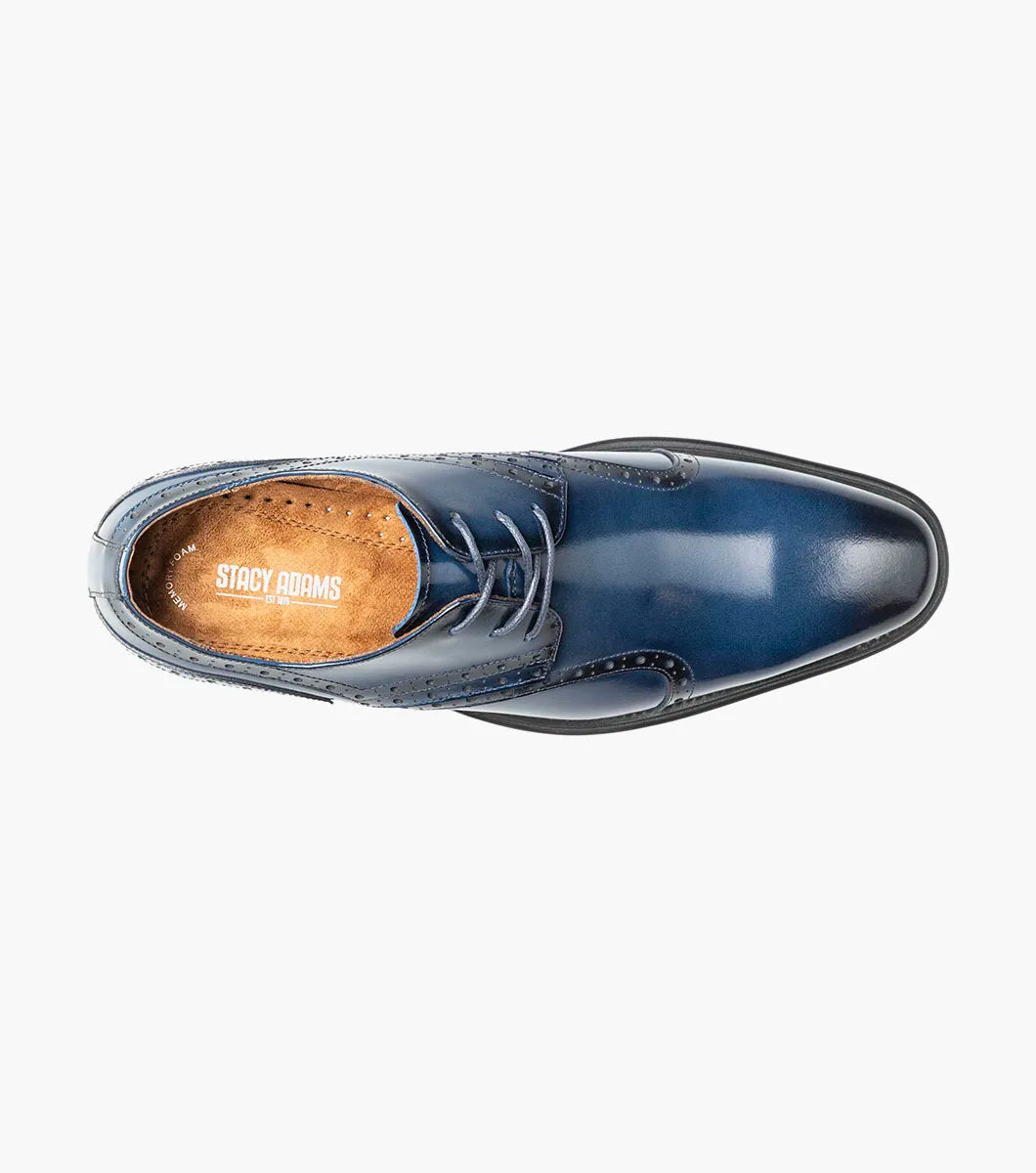 The Stacy Adams Alexander Plain Toe Oxford in Cobalt (style 25791-435) is a single shiny navy blue calf leather dress shoe by STACY ADAMS, featuring decorative perforations, laces, a memory foam insole, and a black sole, displayed against a white background.