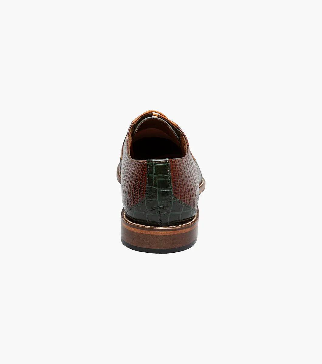 The STACY ADAMS Tristano Modified Bike Toe Oxford (Green Multi, 25694-340) is a men's lace-up shoe made from brown and green crocodile print leather with a low heel and anatomical arch support for comfort.
