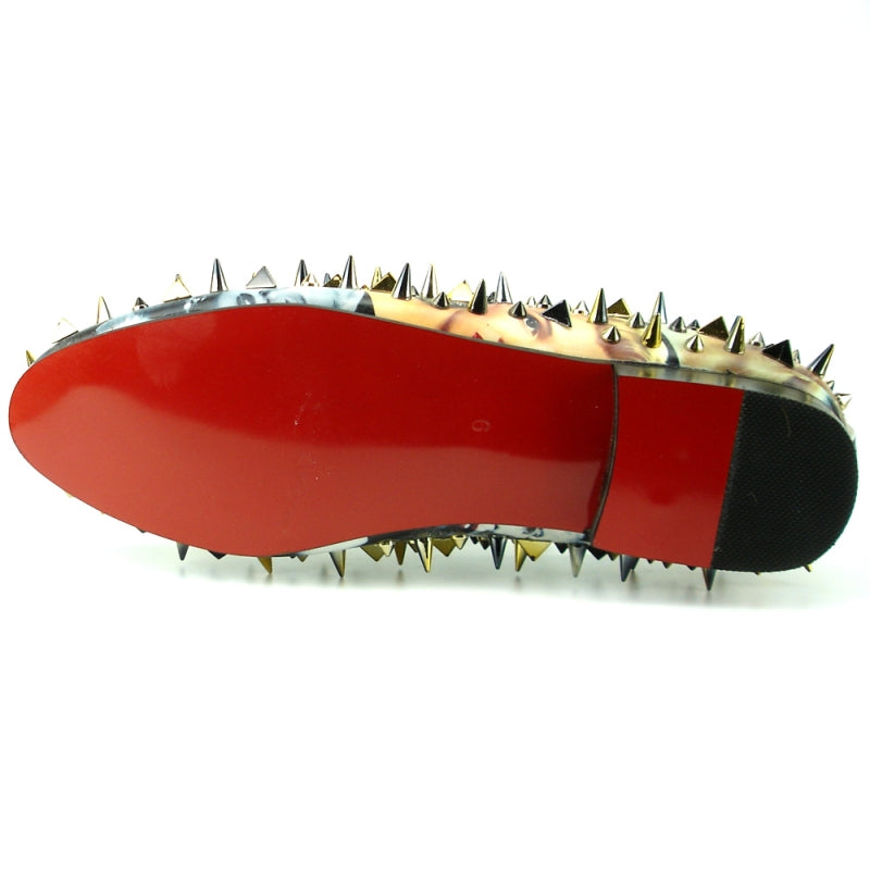 The FI-7239-L Marilyn Gold Spikes by Fiesso is a black slip-on fashion shoe adorned with metallic silver and gold spikes of various sizes and shapes.