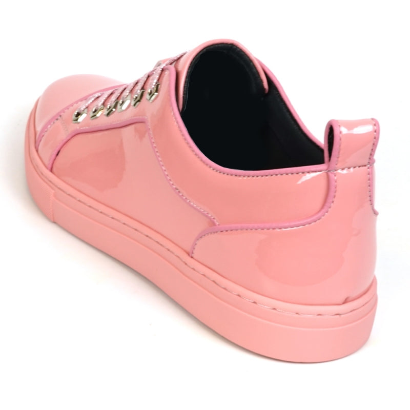 Close-up of the Fiesso FI-2415-2 sneaker in shiny pink patent leather, featuring sparkly pink laces, metallic eyelets, and a cushioned insole for ultimate comfort.