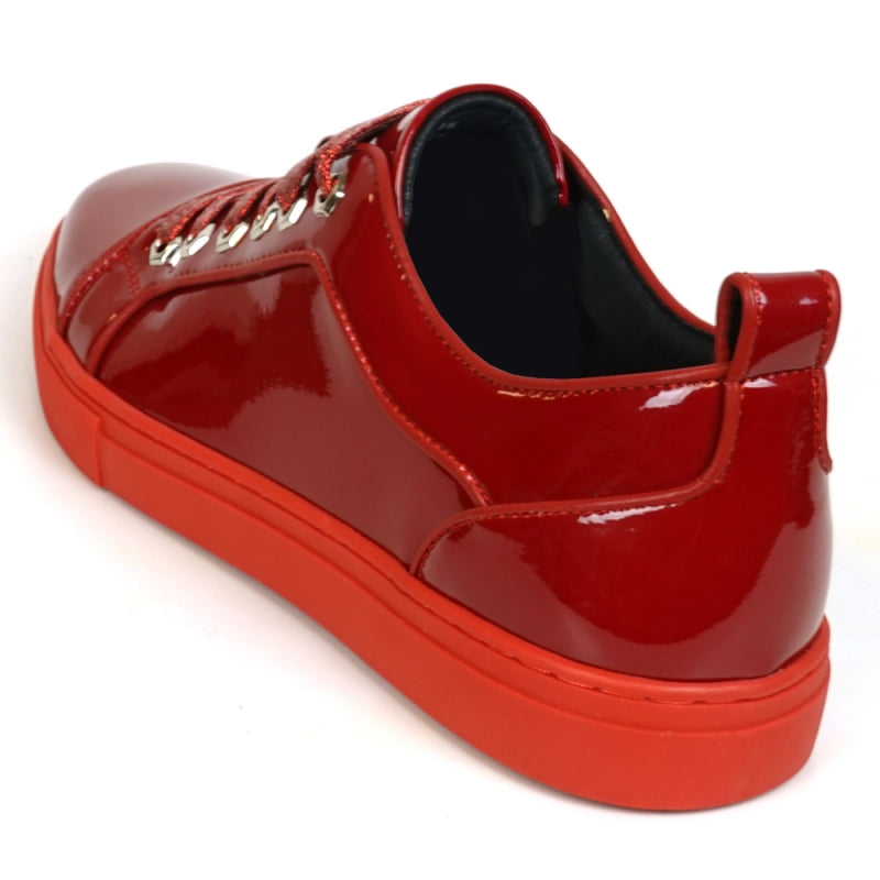 Fiesso's FI-2415-2 Red Patent Lace-up Low Cut Leather Sneaker is striking with its red patent finish, vibrant laces, bold rubber sole, and a glitter upper that adds a glamorous touch—perfect for those seeking style and flair.