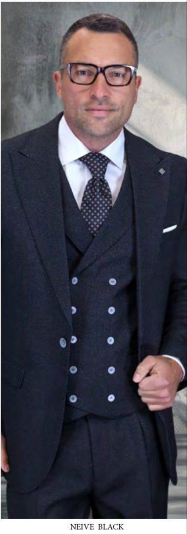 Four men stand side by side indoors, each in distinct suits—one in the STATEMENT CLOTHING | NEIVE-BLACK by Statement Clothing, another in sapphire with a double-breasted vest, and others in light and blue plaid, all styled with wide-leg pants and matching ties.