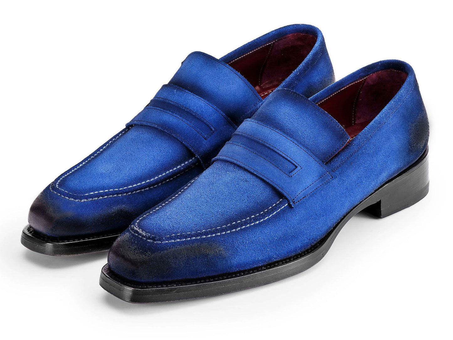 The Paul Parkman Blue Antique Suede Goodyear Welted Loafers (36BQ94) feature black accents and white stitching, shown against a white background.