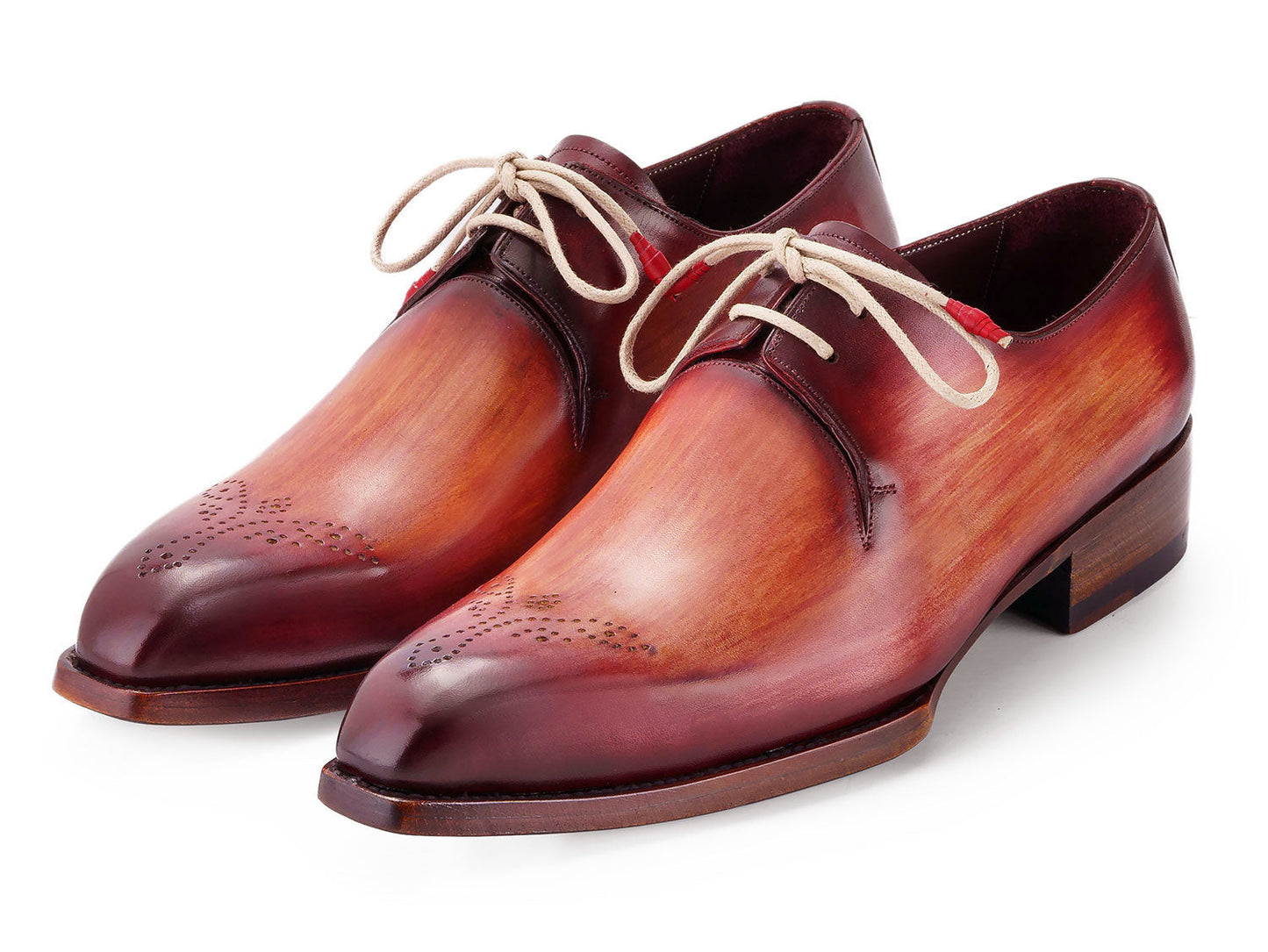 The Paul Parkman Goodyear Welted Derby Shoes 468R21 feature polished, hand-painted leather in a reddish brown gradient with light laces and perforated toe caps, blending style and craftsmanship from the renowned Paul Parkman brand.