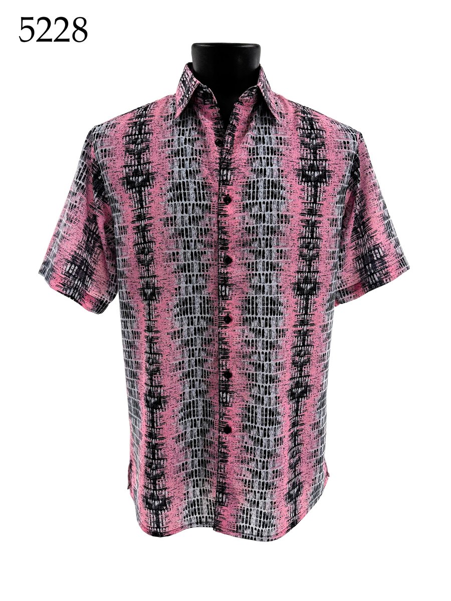The Bassiri Short Sleeve Shirt 5228 by Bassiri features a pink, black, and white abstract pattern and is shown on a black mannequin. The number 5228 appears in the top left corner.