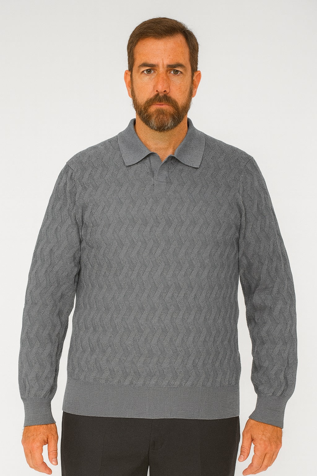 A man with a beard wears the Bassiri Long Sleeve Collar Neck Charcoal Sweater 639, paired with black pants, standing against a plain white background.