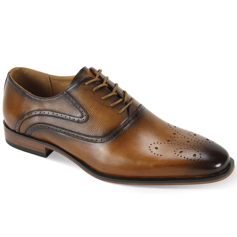 The Giorgio Venturi Giorgio 6996 Tan Leather Shoes are classic lace-up oxfords featuring a medallion toe, decorative perforations, and a low heel, shown on a white background.