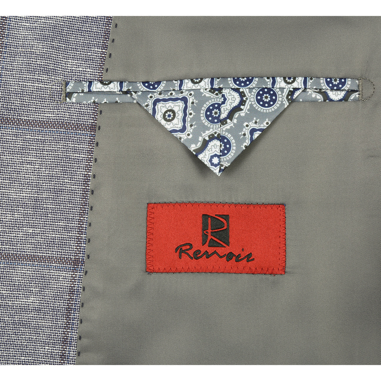 The Alessandro Vitello by Renoir Gray Blue blazer is styled on a mannequin with a white shirt, blue patterned silk tie, and matching pocket square.