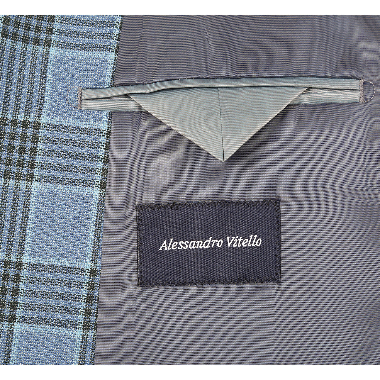 The Alessandro Vitello by Renoir New Slim Fit Sport Coat 565-14 features a blue plaid pattern, single-breasted two-button closure, notch lapels, chest pocket square, and flap pockets—shown on a mannequin with white shirt and striped tie.