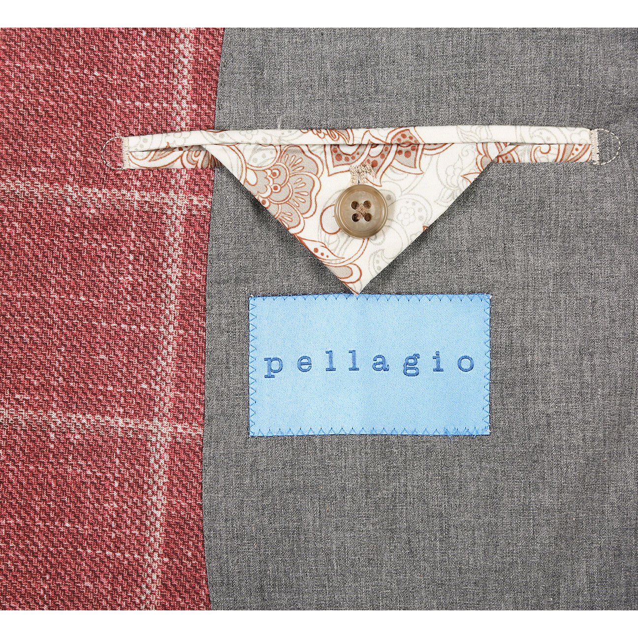 The Pellagio Men's Half Canvas Blazer Crimson PS25-3 features a red plaid, single-breasted design with white windowpane pattern and notched lapel, styled with a white shirt, striped tie, and beige pocket square on a mannequin.