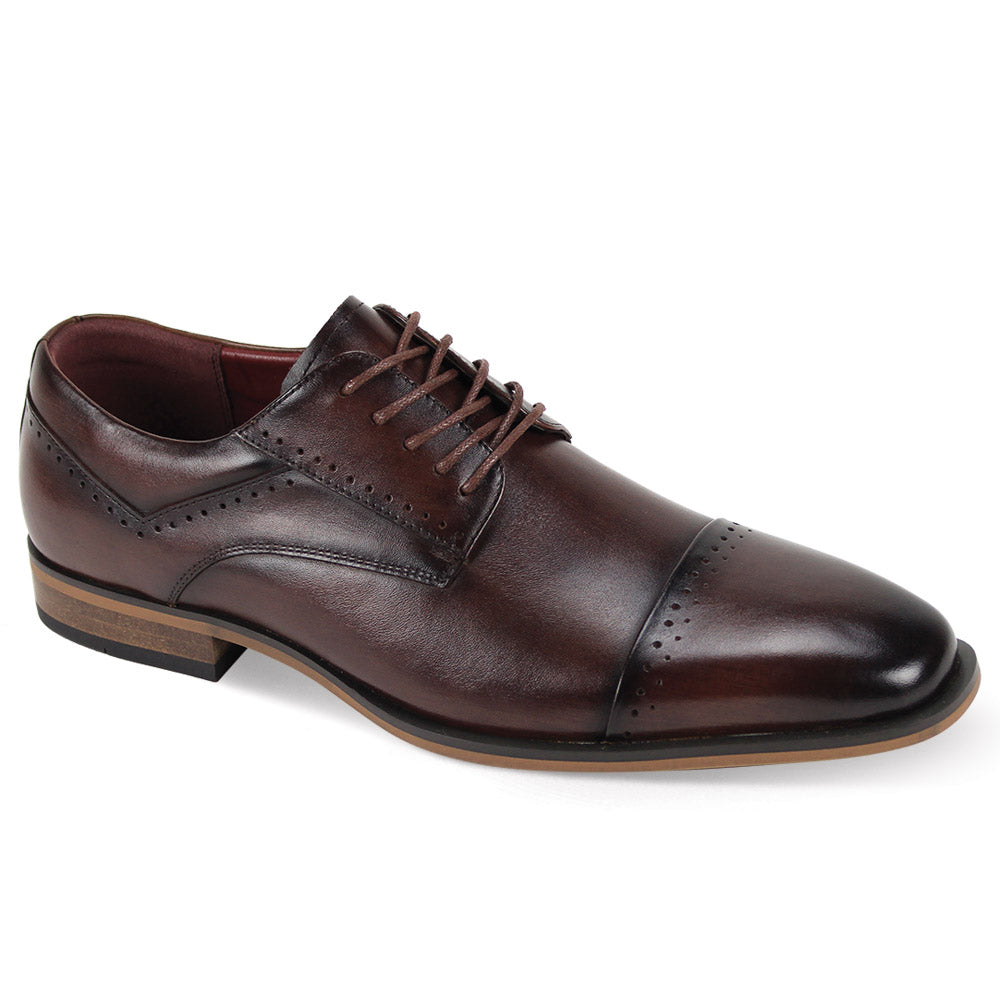 The Giorgio Venturi Giorgio 7033 Brown Leather Shoes are men's dress shoes with lace closure, a cap toe, and brogue detailing, shown angled to the left.