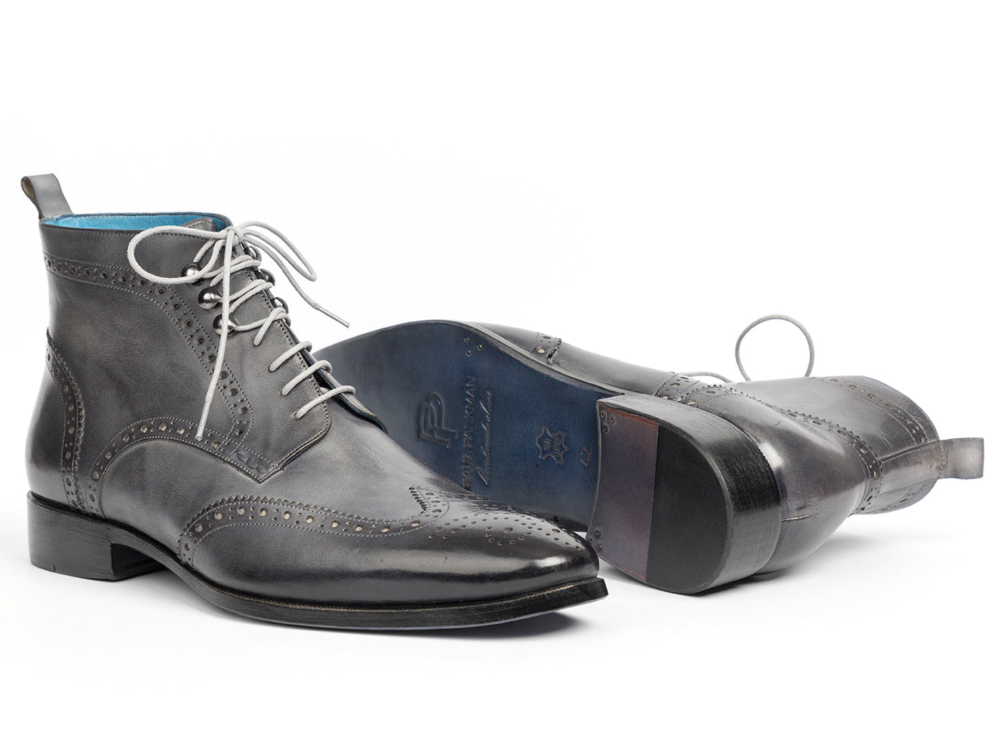 The Paul Parkman Wingtip Ankle Boots Gray Hand-Painted (777-GRAY) feature black hand-painted leather, light gray laces, and a blue inner lining, shown on a white background.