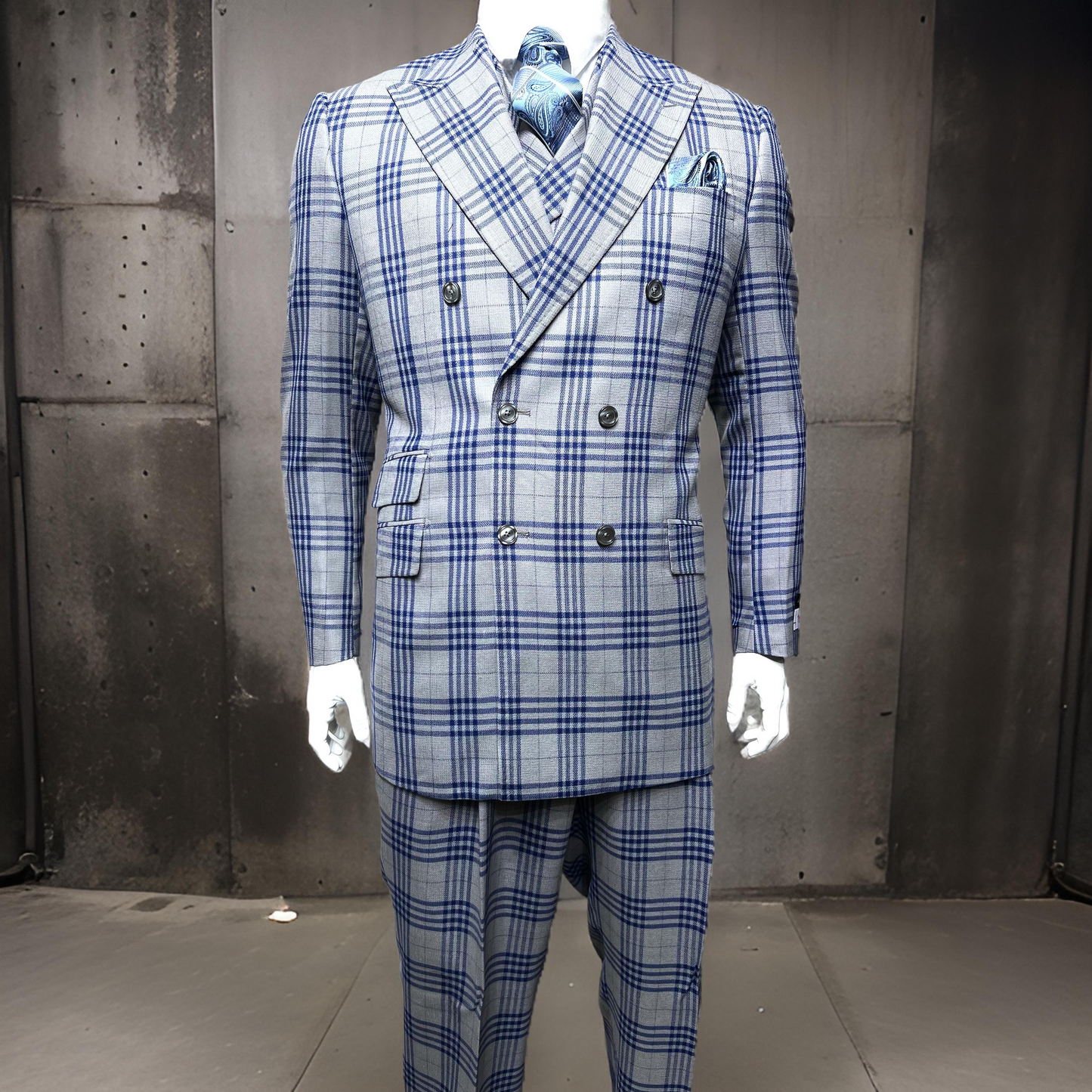 A mannequin wearing a Tiglio Rosso DB Este Grey/Blue Plaid TL4269 suit (46L and 50L only).