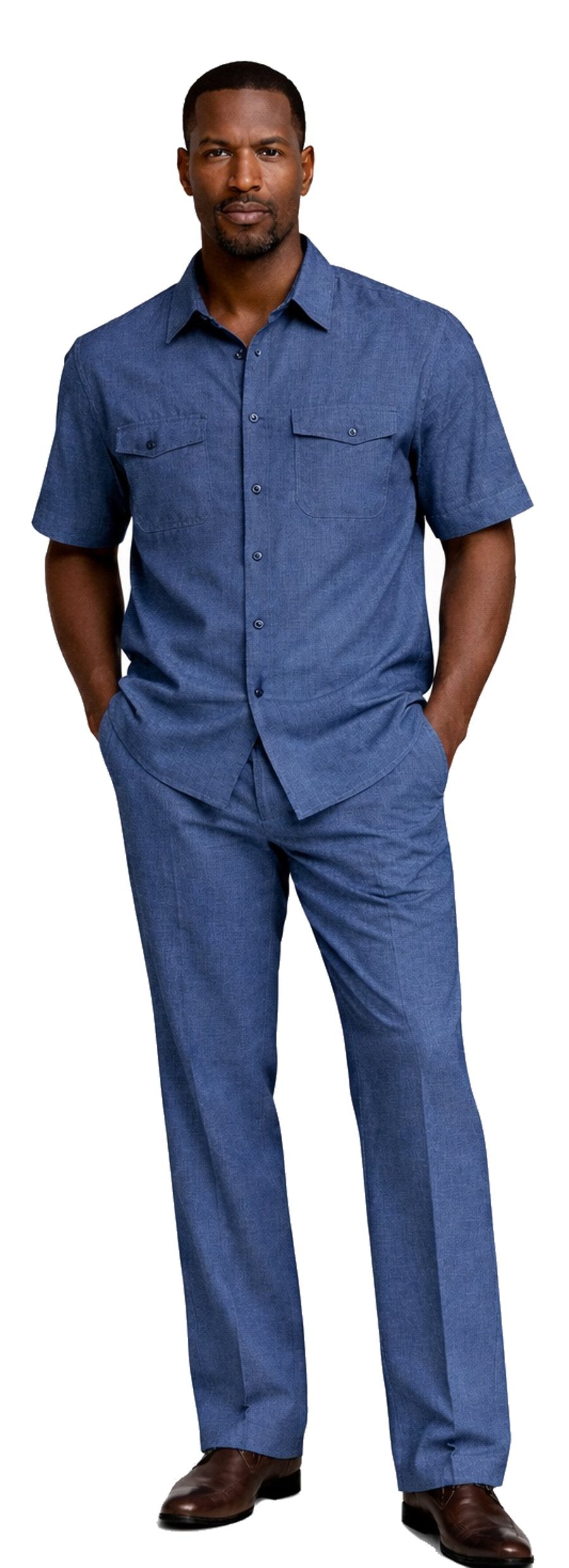 A man stands with hands in pockets, wearing the Bassiri Navy 2pc Set A 145 by Bassiri and brown shoes.