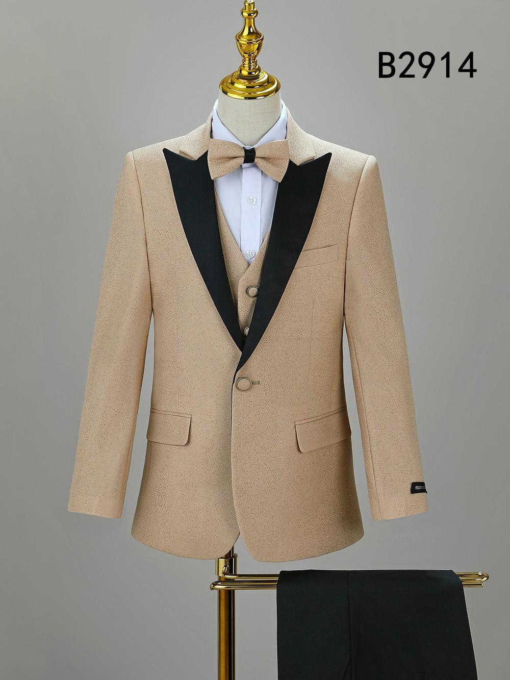 The Unique Design Menswear BOY SUIT 5-PC SET B2914 features a beige suit with black lapels, matching vest, white shirt, and beige bow tie on display—a stylish formal set for boys perfect for special occasions.