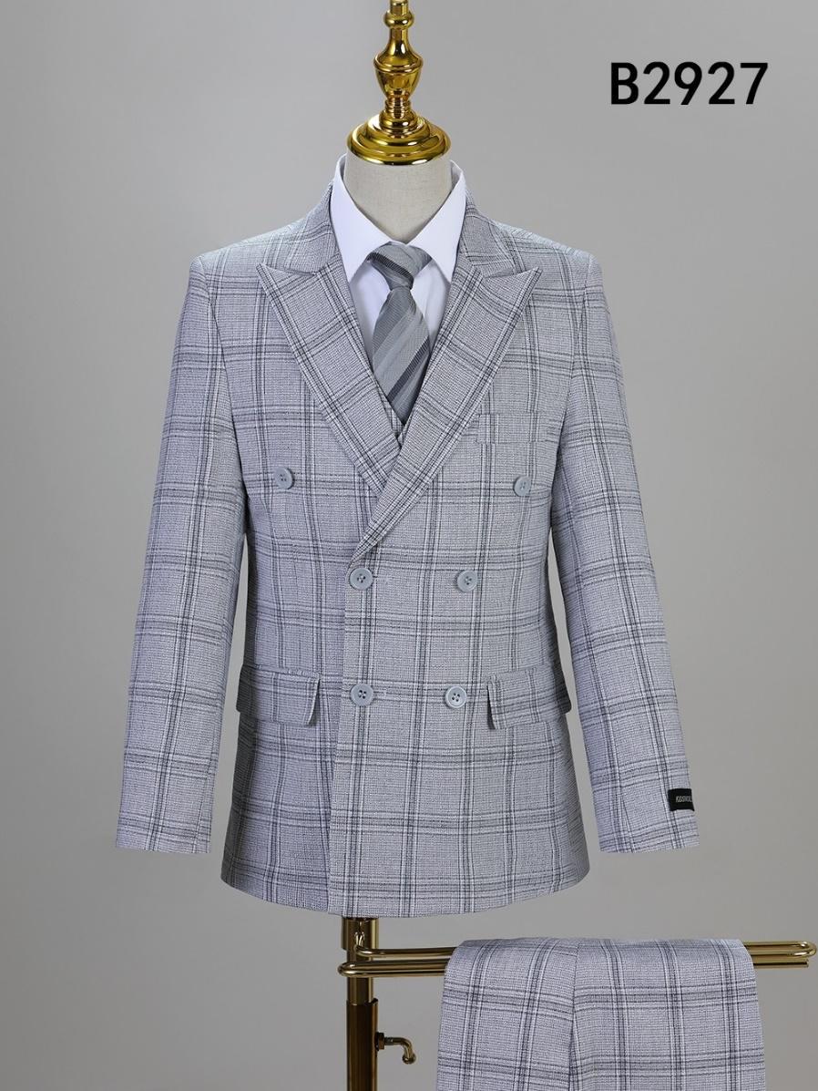 BOY SUIT 5-PC SET B2927 by Unique Design Menswear displayed on mannequin: gray plaid double-breasted jacket, white dress shirt, gray tie, with pants draped on stand. "B2927" shown in the top right corner.
