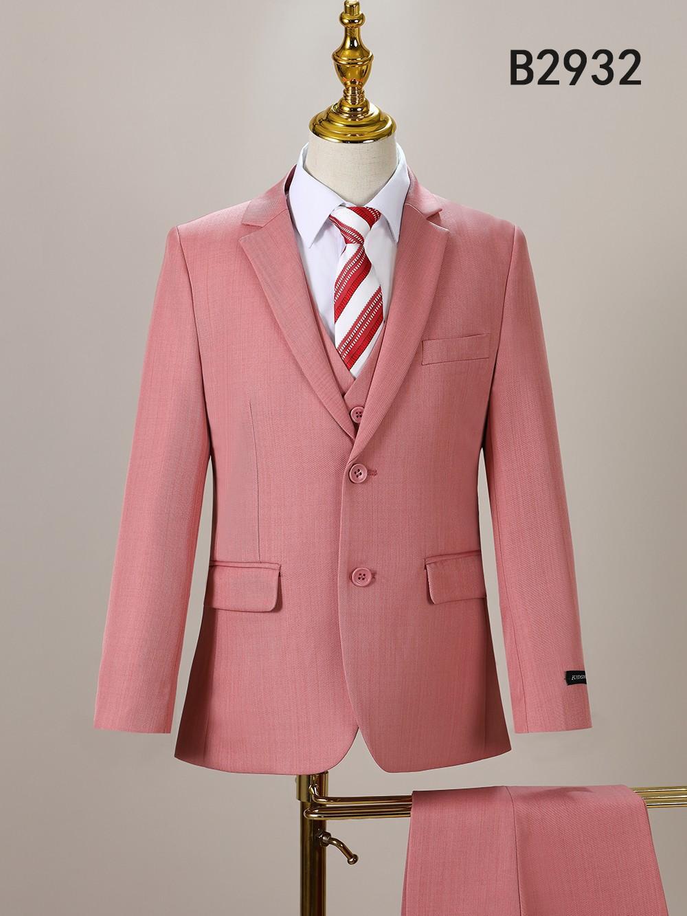 The Unique Design Menswear BOY SUIT 5-PC SET B2932, shown on a mannequin, includes a pink jacket, pants, vest, white shirt, and red striped tie.