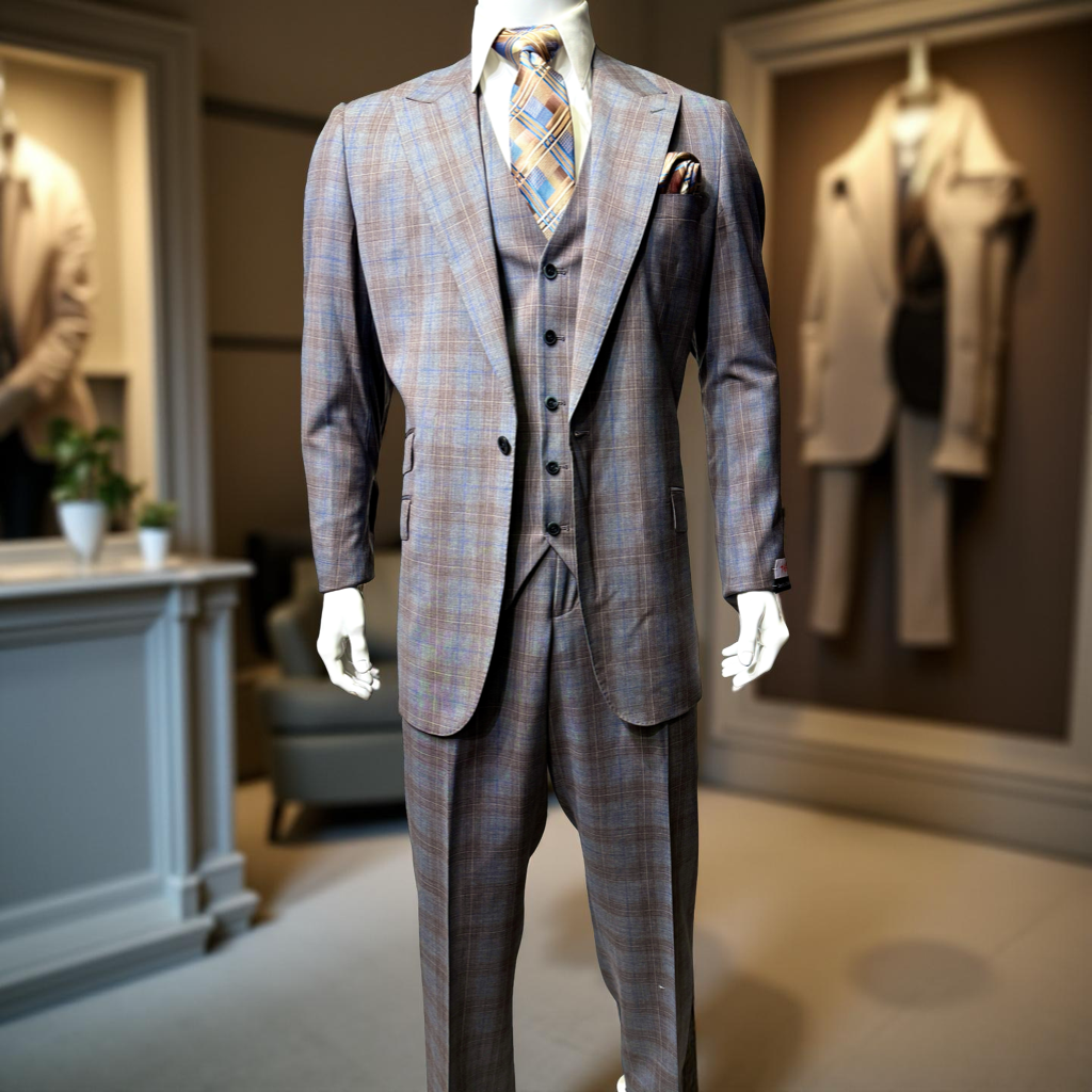 A mannequin in a Tiglio Rosso Grey/Brown/Blue Portofino Semi Wide Leg TL8051 suit, adorned with a striped tie and pocket square, showcases the elegance of Tiglio Rosso suits. Crafted from 100% wool, this sophisticated ensemble is featured amid stylishly displayed wide leg suits.