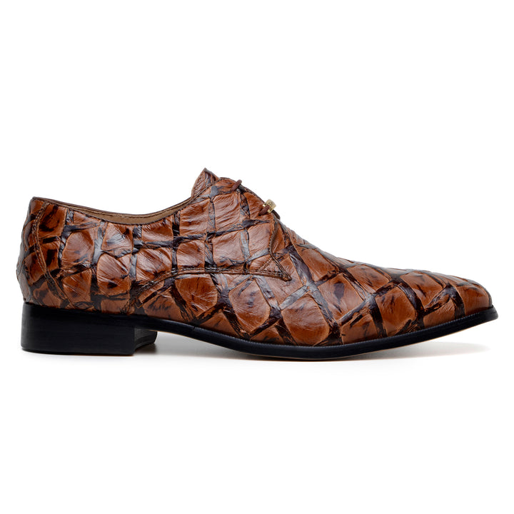 The Belvedere Renzo Genuine Pirarucu Shoe in Ant Almond features a brown crocodile-pattern design, lace-up derby style, slight heel, and gold-tone metal accents.