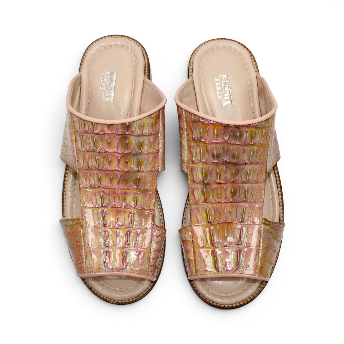 The Fennix Diego Pink by Fennix of Italy is a flat open-toe sandal crafted from genuine alligator leather in a striking pink and yellow crocodile pattern, featuring cut-out details and a low wooden heel for an exotic touch of luxury, shown in profile against a white background.