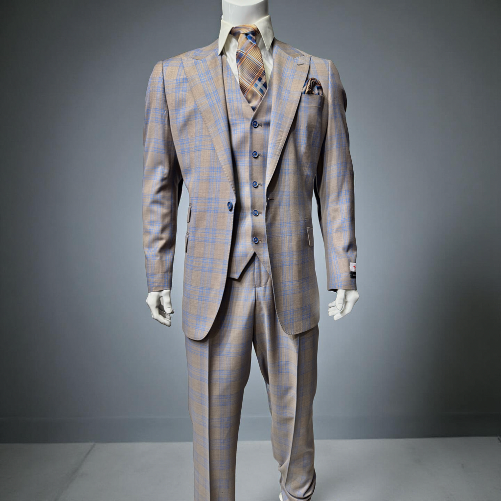 A mannequin is dressed in the Tiglio Rosso Portofino Light Taupe Blue Semi Wide Leg TL8312 suit, complete with a matching tie and pocket square, showcased in a gray minimalist setting.