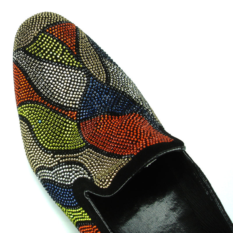 Introducing the FI-7068 Multi Color Fiesso by Aurelio Garcia, a handcrafted leather slip-on shoe for men from Fiesso. Decorated with vibrant abstract bead patterns in red, blue, orange, green, and gold on a sleek black base, these shoes make a bold statement and effortlessly elevate your style. Combining artistry and fashion in every step, they’re the perfect addition to any wardrobe.
