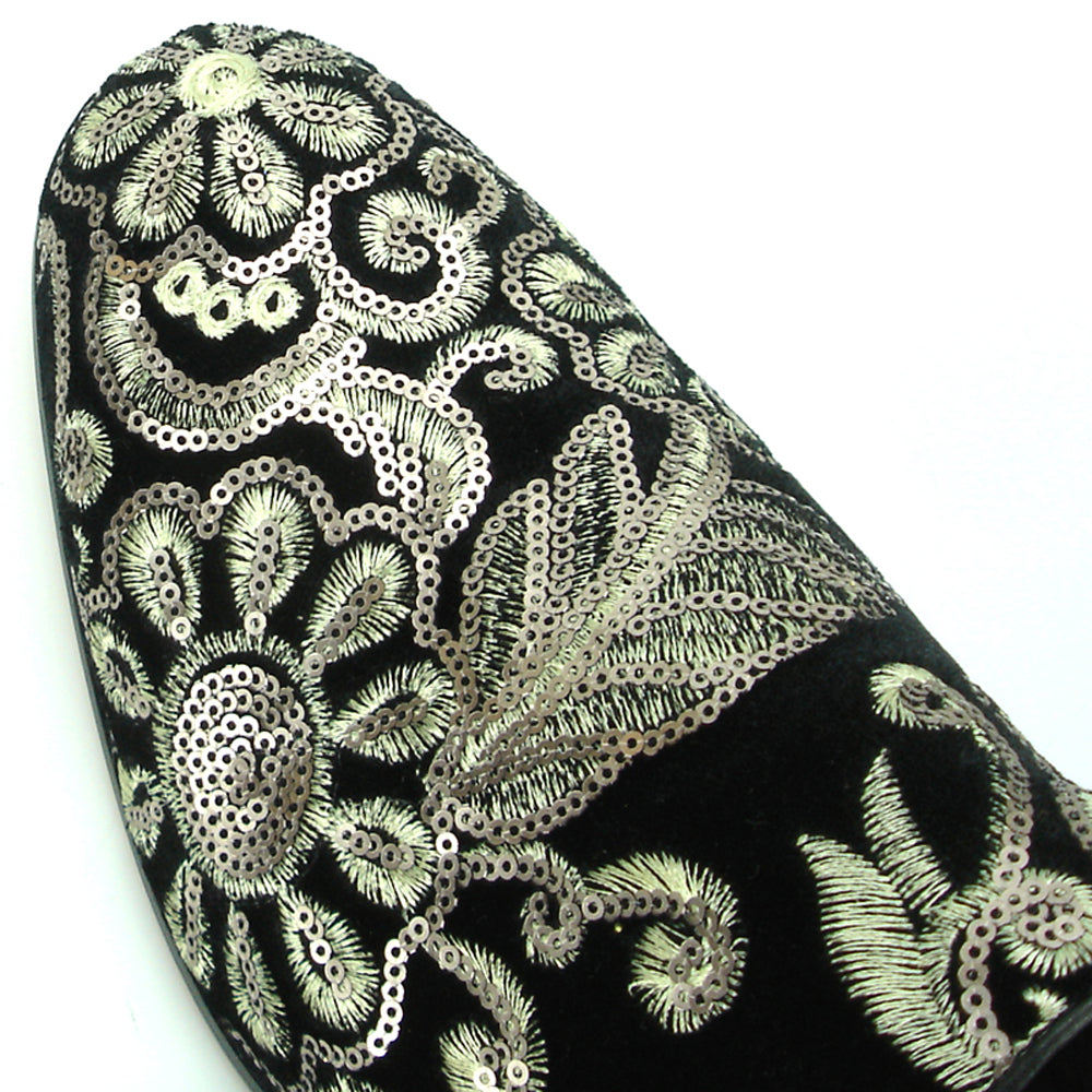 The FI-7207 Black Suede with Sequins Slip on Loafer by Fiesso features intricate silver sequin embroidery in floral and leaf designs, elevating men’s fashion with handcrafted suede and leather details.