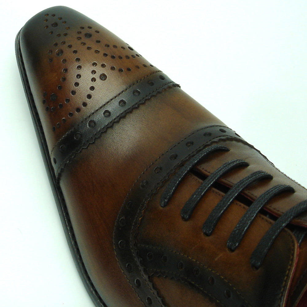 The FI-8713 Coffee Leather Cap Toe Lace Up Encore by Fiesso is a handcrafted men's oxford with brogue detailing, black laces, and a low heel—perfect for elevating your style.