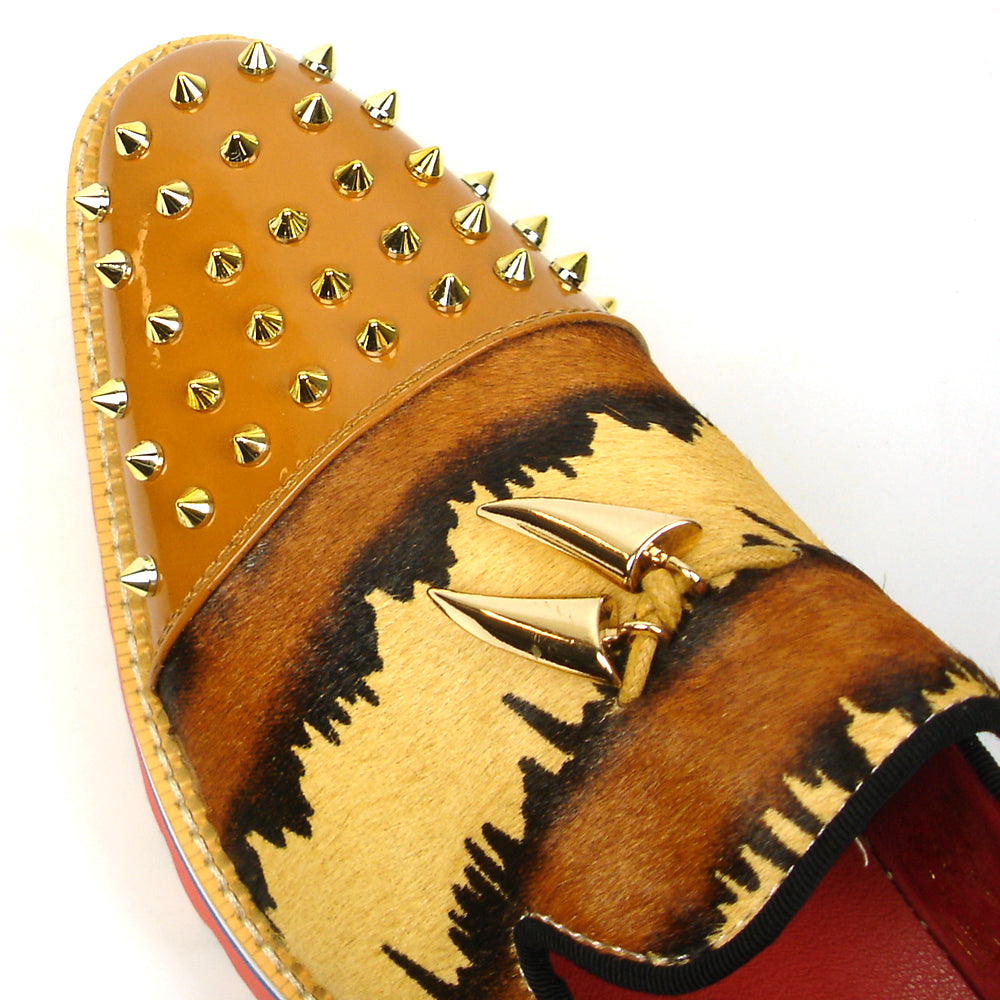 The FI-7455 Brown Cap Toe Spikes Slip On by Fiesso features gold spikes on a brown toe, animal print sides, red interior and sole, plus a bold blue stripe—a striking, handcrafted leather loafer for standout men’s style.