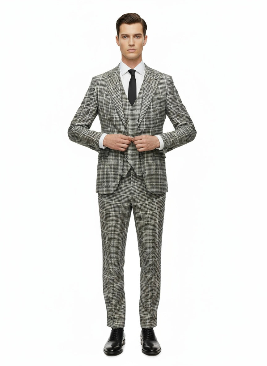A person stands facing forward, wearing the Tiglio Luxe Green and Navy Glens Plaids Prosecco Modern Fit Pure Wool Suit & Vest TL2715 by Tiglio Luxe, paired with a crisp white shirt and black tie, set against a plain white background.