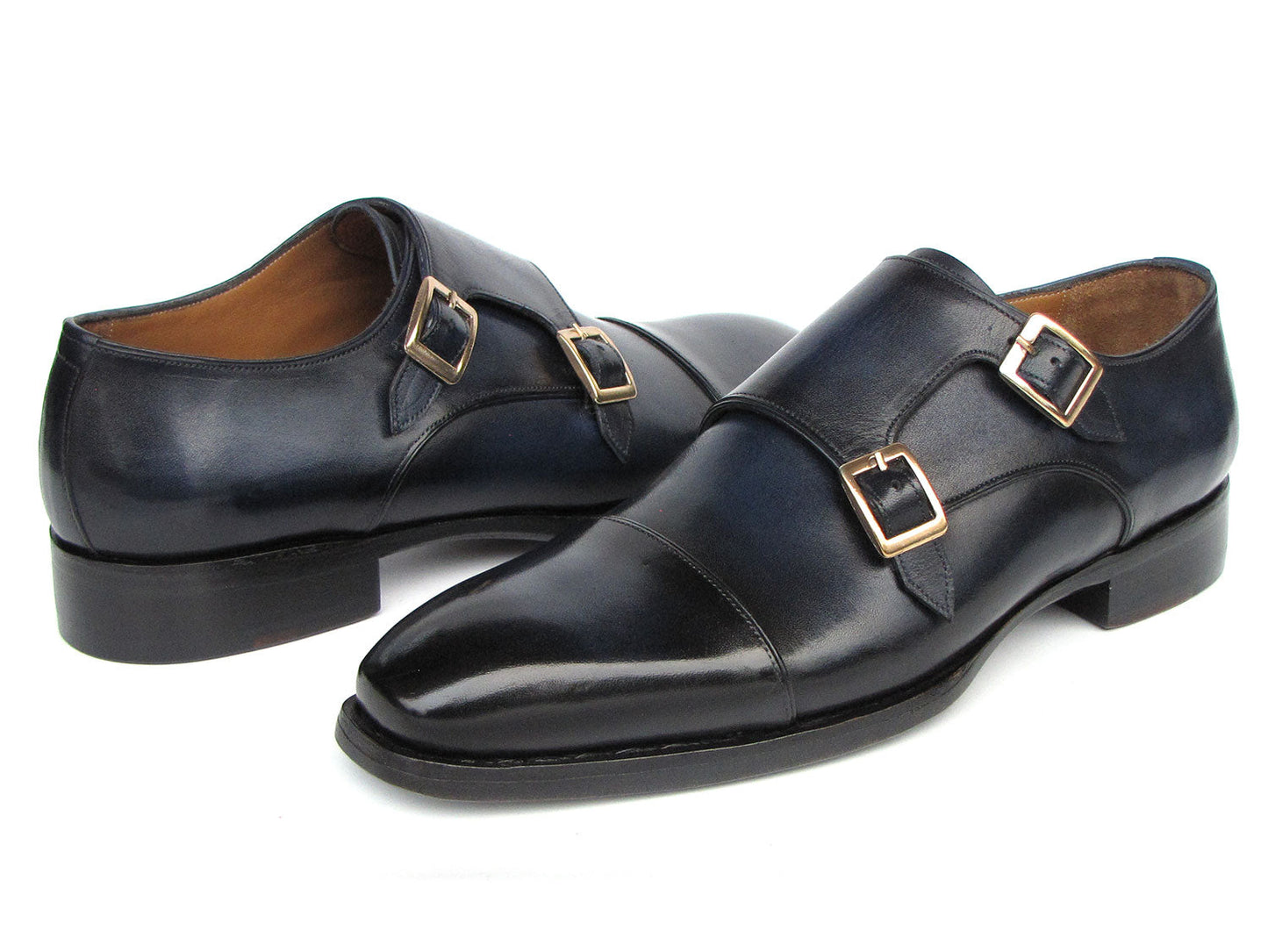 A pair of Paul Parkman Goodyear welted double monkstrap shoes in navy, featuring silver buckles, resting on a white background.