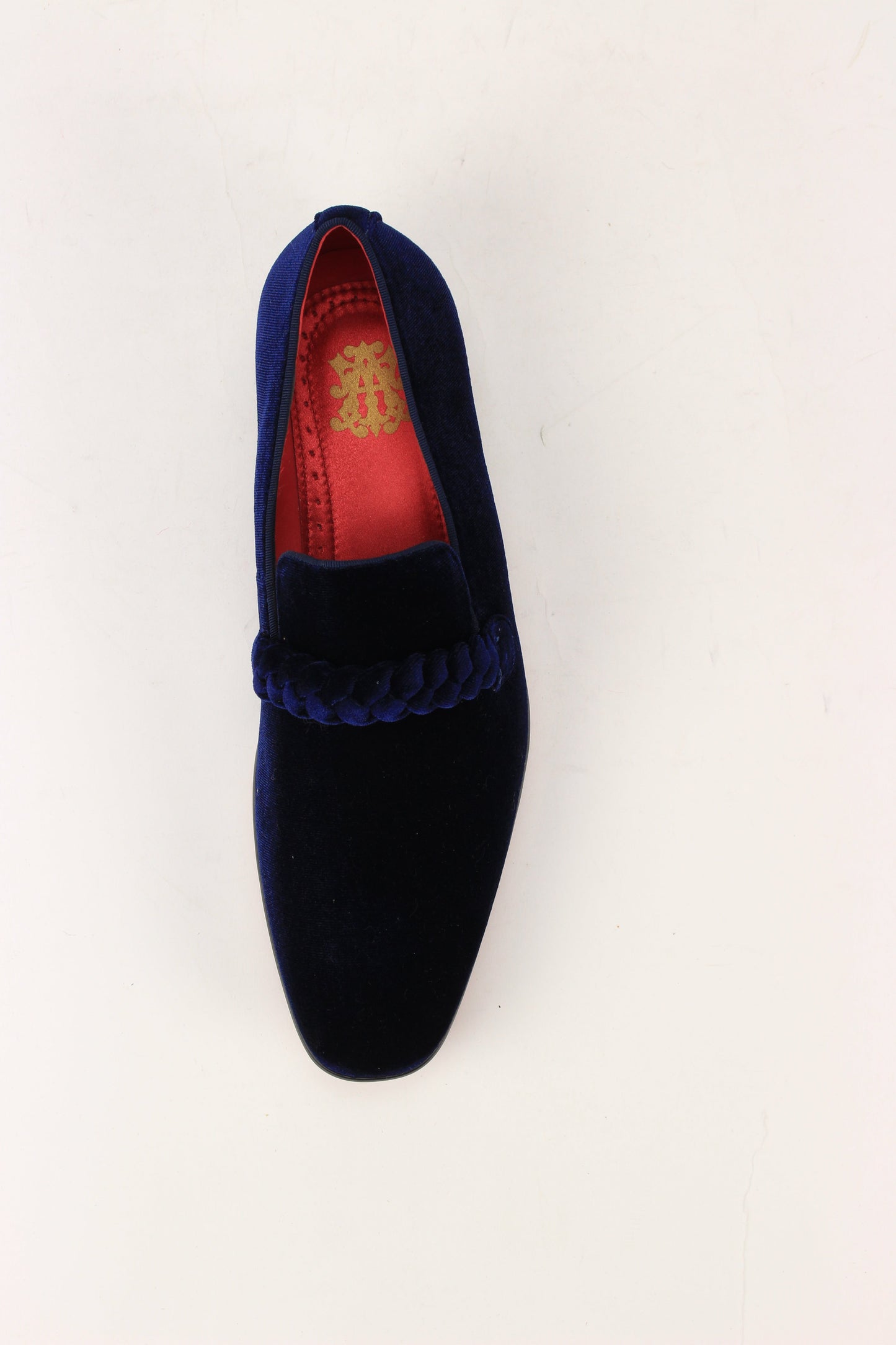 The After Midnight 7067 Navy Dress Shoes by AFTER MIDNIGHT feature a navy velvet upper with braided strap detail and a red insole adorned with a gold emblem.