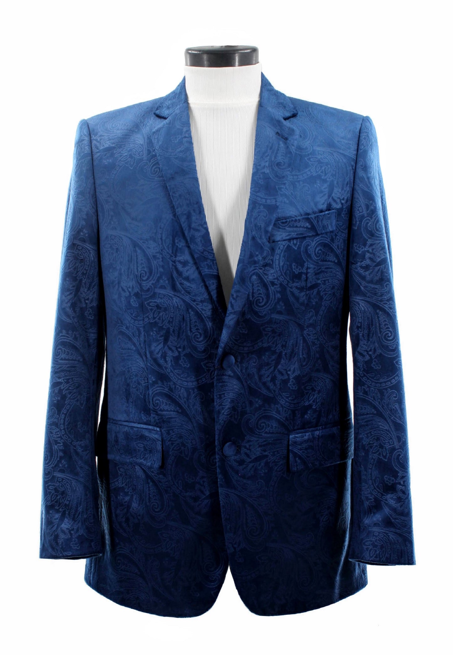 The Bassiri Blazer J1044-M Blue by Bassiri is elegantly displayed on a mannequin over a white turtleneck. This grey-blue paisley-patterned piece radiates sophistication and style.