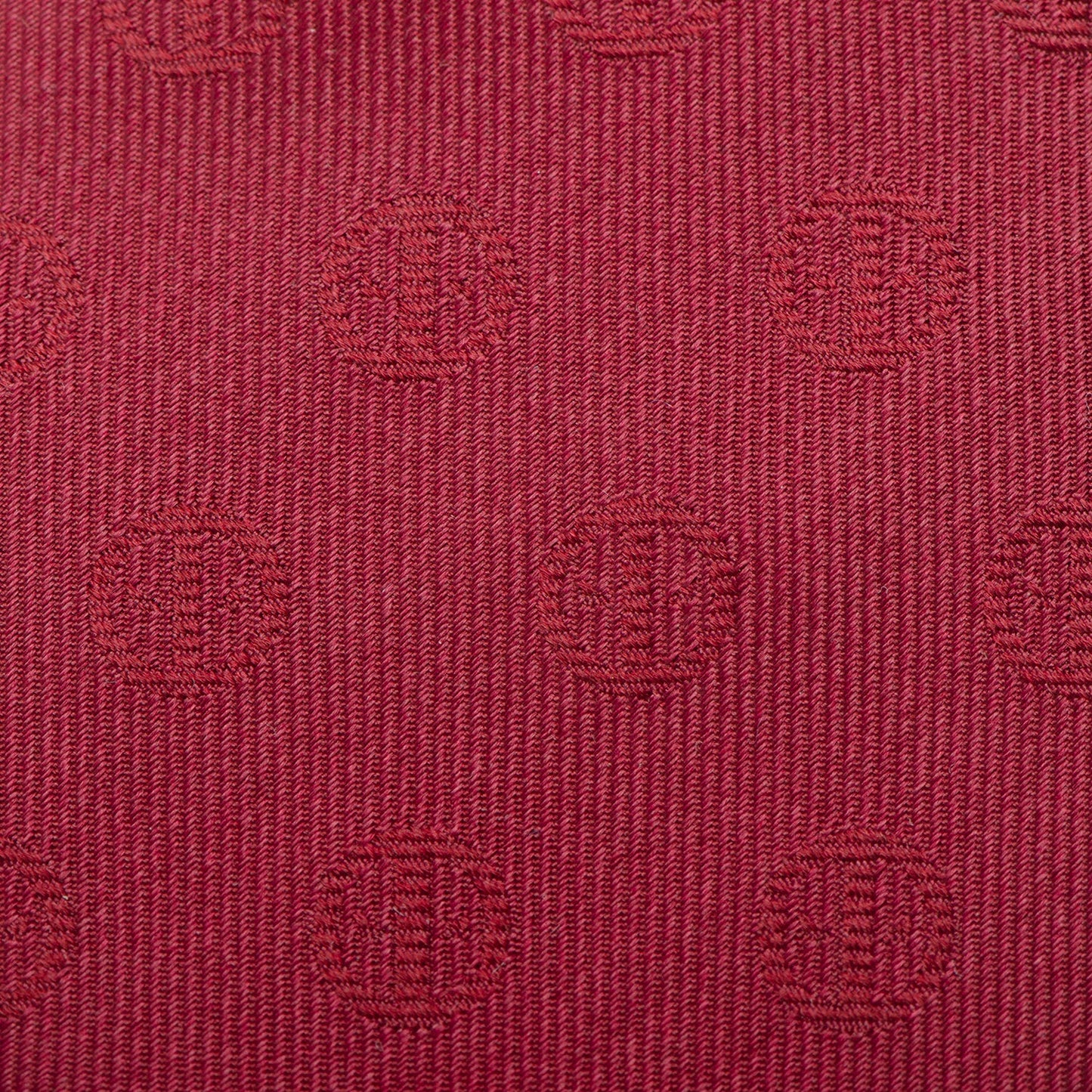 The Marvel Deadpool Maroon Men's Tie by Cufflinks.com features a subtle circular pattern and is displayed rolled-up on a white background.