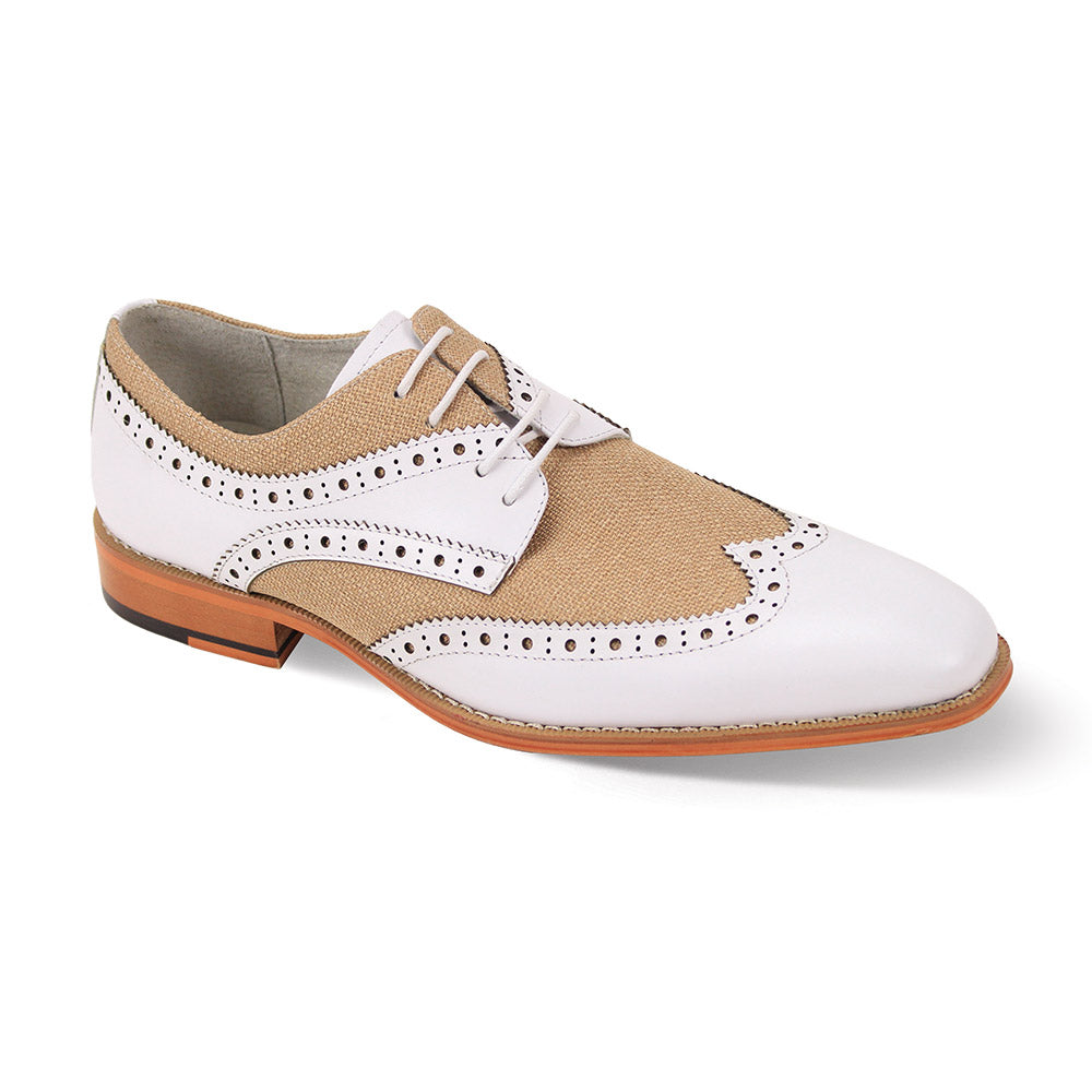 The Giovanni Nico by GIOVANNI is a stylish two-tone dress shoe featuring a tan fabric upper with white leather accents and elegant wingtip perforations. It boasts a brown leather sole and classic lace closures for a refined touch.