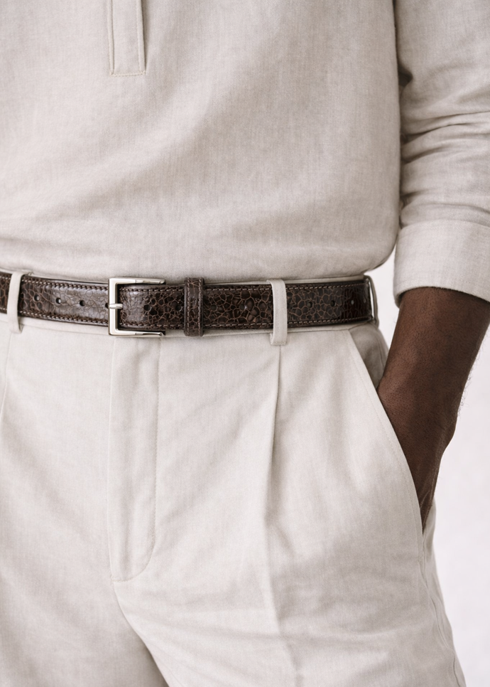 The BELVEDERE Belvedere Ostrich Leg Belt Chocolate Brown 2000 is a textured leather adjustable belt with a silver rectangular buckle, shown laid flat with visible holes and stitching; ideal for size 44.