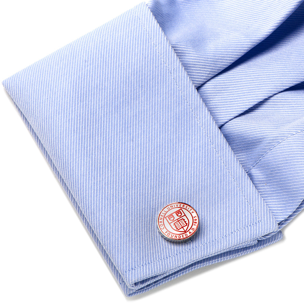 NCAA Cornell University Cufflinks by Cufflinks.com feature a round design with the red and white school crest and "Founded A.D. 1865"—an ideal gift for alumni and fans.
