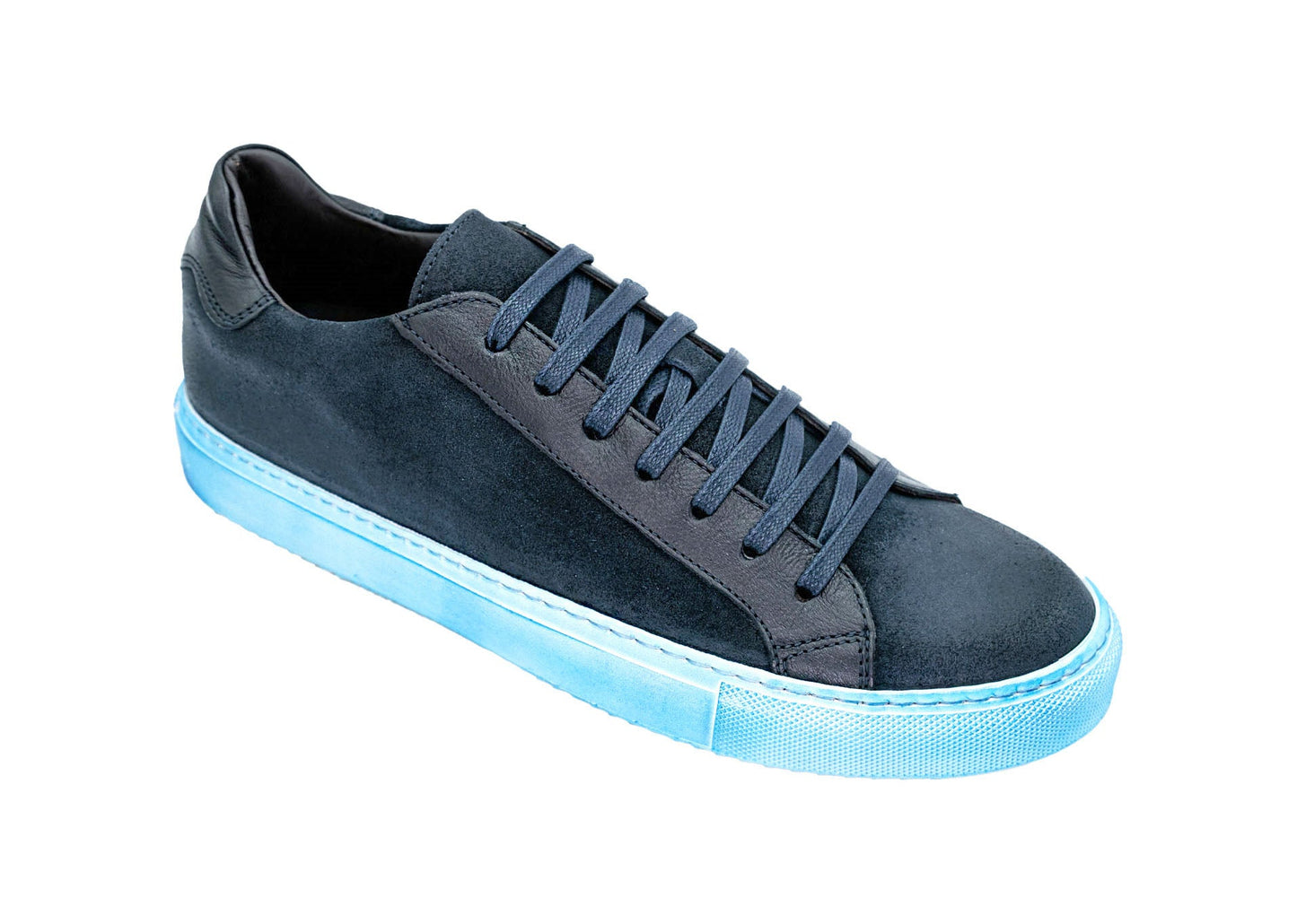 The GIOVACCHINI Rino Blue Suede Leather Sneakers feature dark blue Italian waxed suede, matching laces, a light blue rubber sole, and leather lining, shown from a front side angle on a white background.
