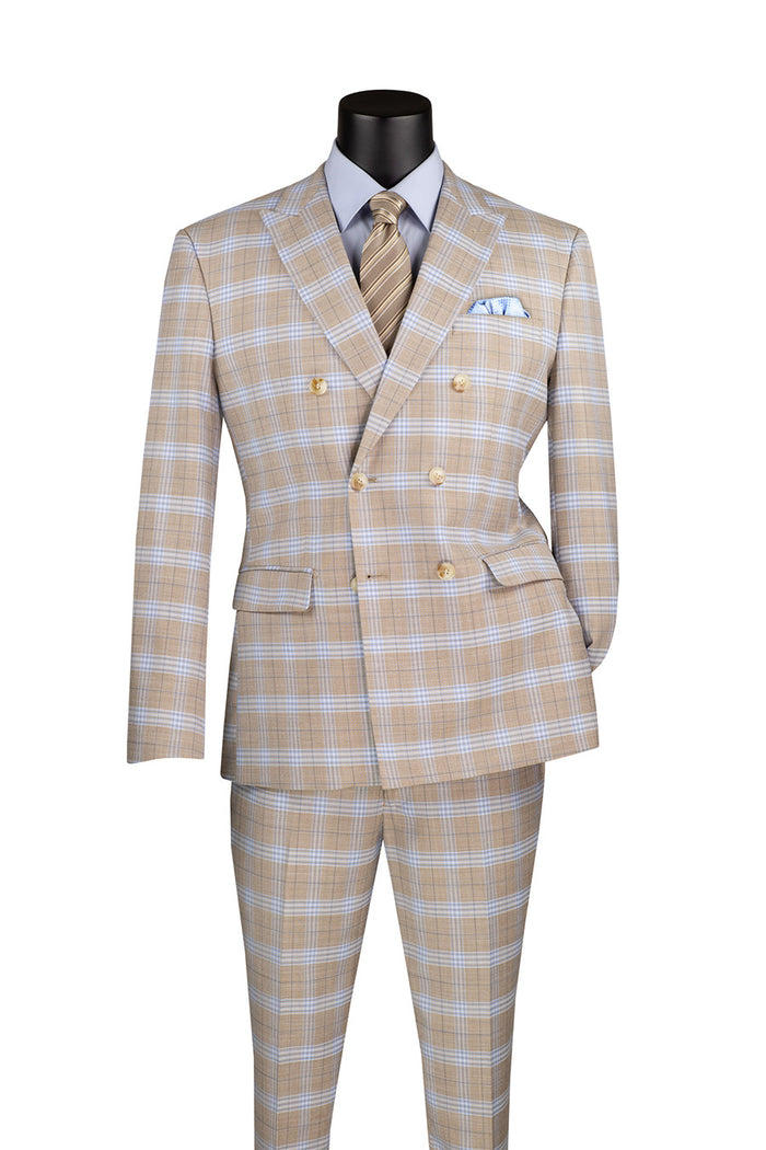 The Vinci Suits Slim Fit 2 Piece Double Breasted Windowpane Suit in Tan elegantly drapes on a mannequin, accented by a blue shirt, patterned tie, and pocket square.