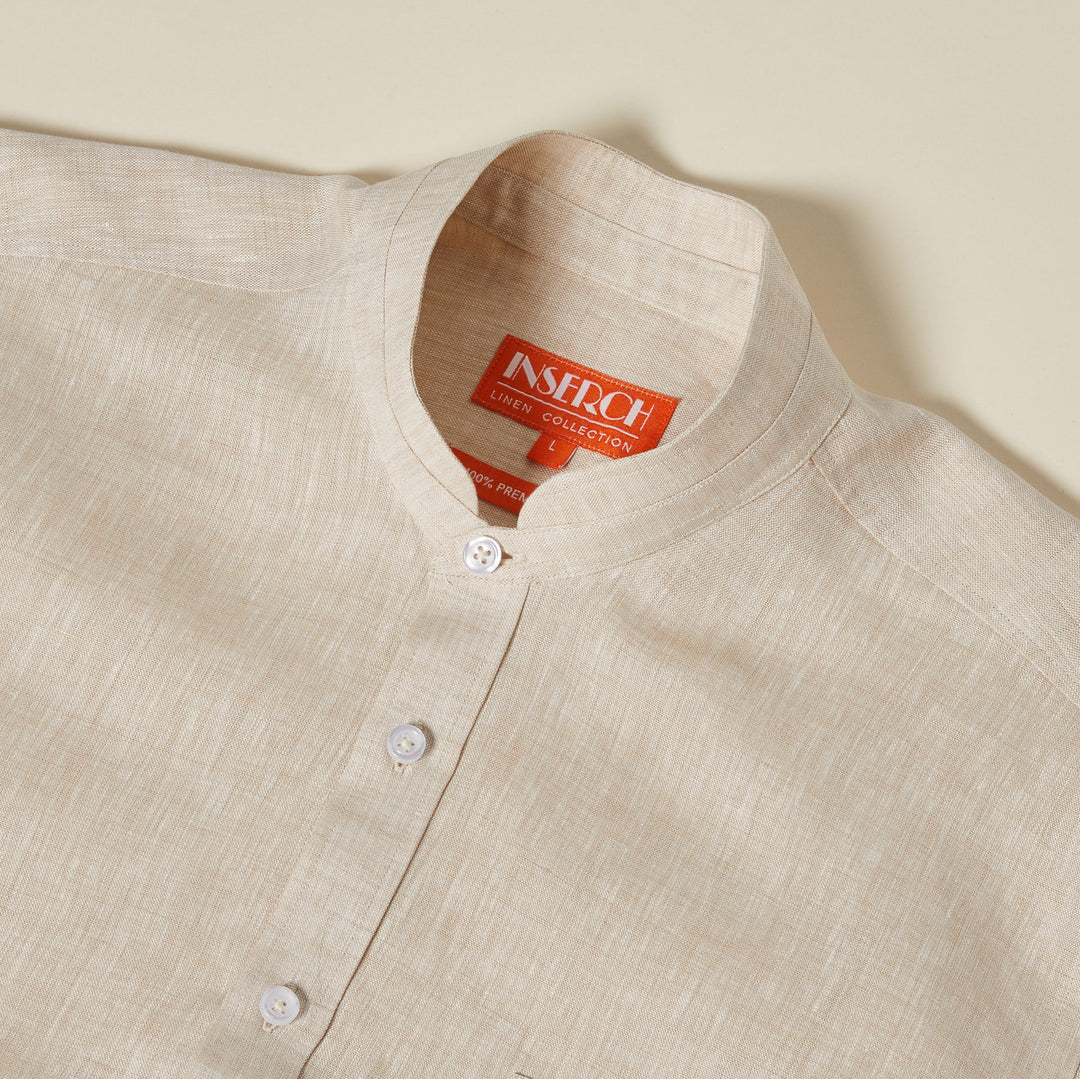Inserch SS Banded Collar Linen Shirt SS716-00006 in oatmeal features a mandarin collar, pearlized buttons, and an orange label marked "INSECT.