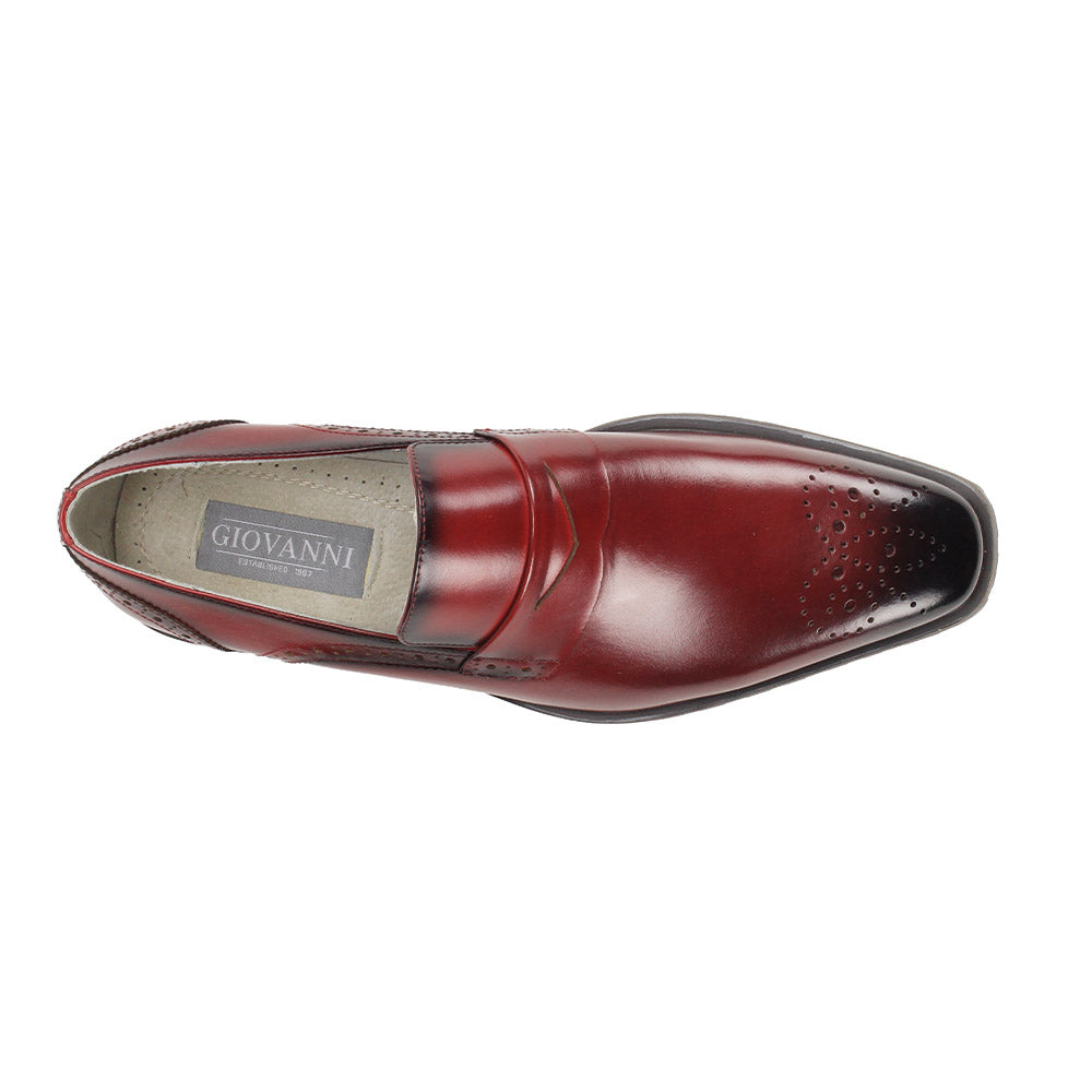 The GIOVANNI Giovanni Silvio Wine Leather Shoes feature a single slip-on loafer in wine leather with a plain toe, brogue details, low heel, and rugged rubber sole.