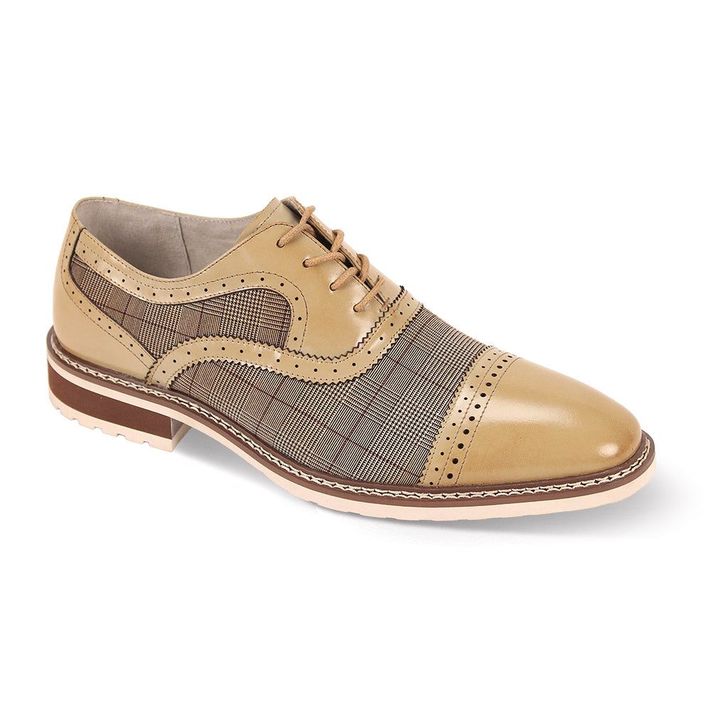 The Giovanni Sinclair Natural/Brown Leather Shoes by GIOVANNI are tan and brown brogues with a lace-up closure, cap toe design, and elegant perforated detailing.
