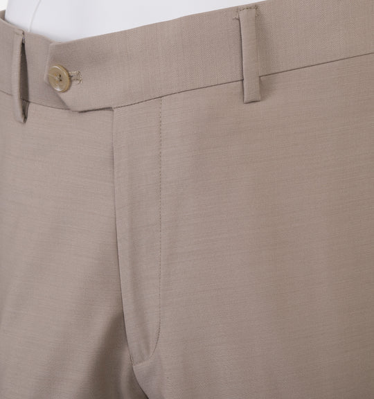 Close-up of the waistband and upper section of the Tiglio Luxe Novello Tan Pure Wool Men’s Suit TIG1004, featuring a button closure, belt loops, and part of a white shirt tucked in.
