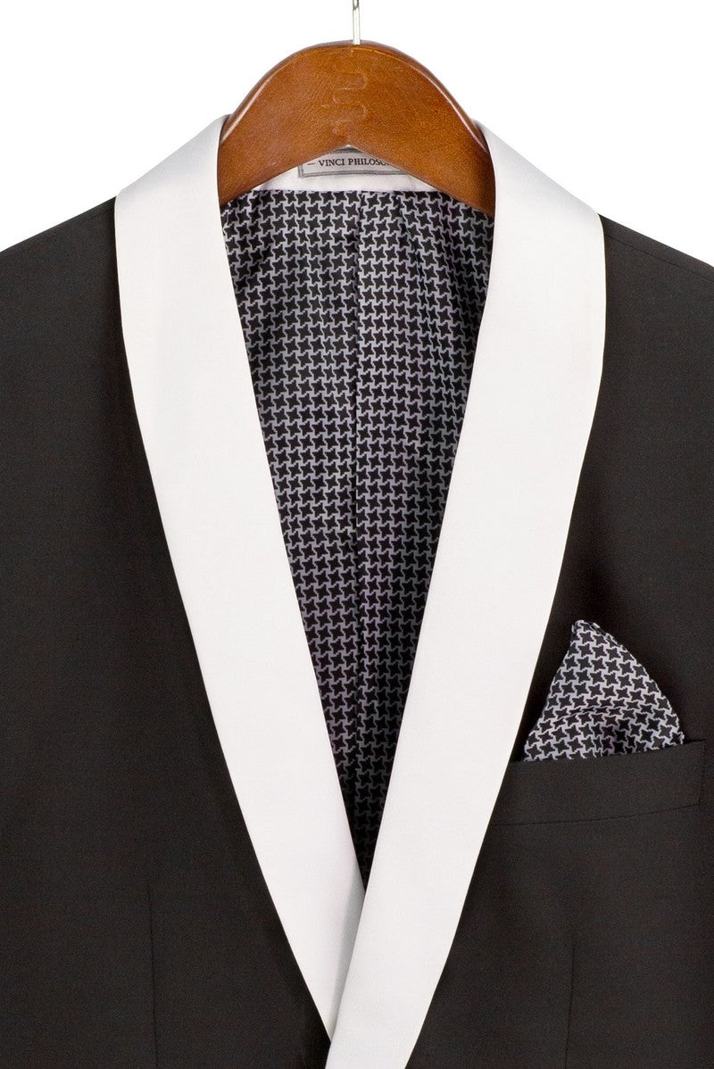 Slim Fit 2 Piece Stretch Fabric Suit Black TSS-2 by Vinci Suits, styled with a sequin shirt, black & white bow tie, and pocket square on a mannequin.