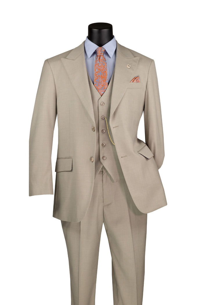 The mannequin showcases Vinci Suits' Regular Fit 3 Piece Suit Oatmeal V2RK-4 featuring adjustable waistband pants, complemented by a light blue shirt, orange patterned tie, and matching pocket square.