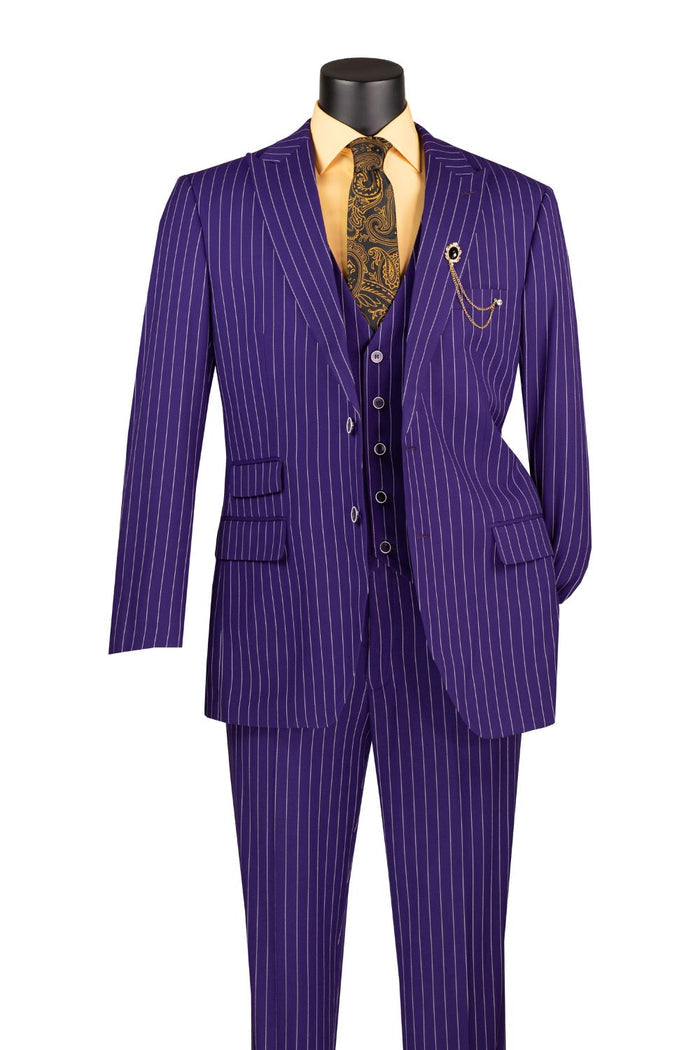 The Vinci Suits Regular Fit 3 Piece Suit, a striking purple V2RS-9 with gangster stripes, features a single-breasted peak lapel jacket, waistcoat, and flat front pants. It’s elegantly complemented by a yellow shirt, paisley tie, and chain accessory for a meticulous finish.